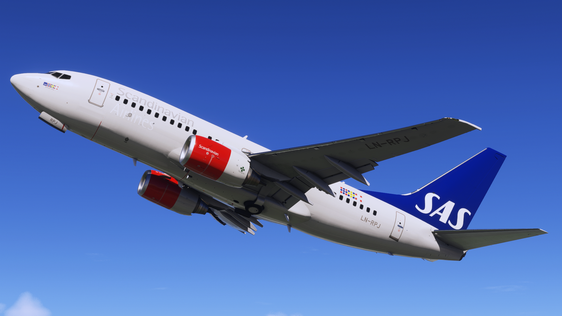 SAS Boeing 737 climbing against a blue sky